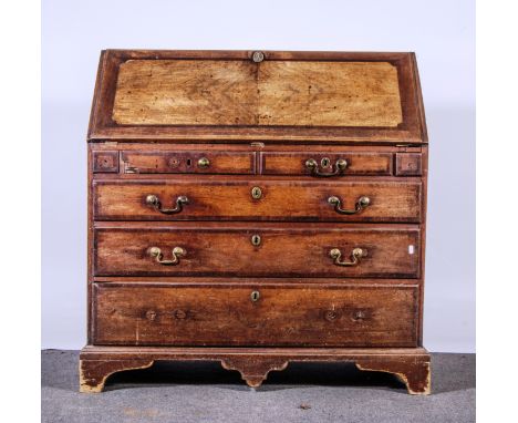19th Century mahogany slope and fall front bureau, with cross banding, fall front with fitted shaped interior, two short and 