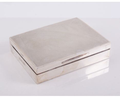 A silver cigarette box, by W. Neal & Sons, Birmingham 1961, engine turned, cedar wood lining damaged, 10.5cm x 8.5cm.
