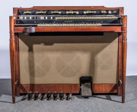 Hammond organ, mahogany case and stool, 115cm wide, 64cm deep, 94cm high, (2).