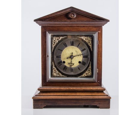 Edwardian oak mantel clock, architectural form, brass dial with cast spandrels, silvered chapter ring, Continental movement s