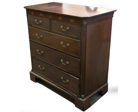 Victorian mahogany chest of drawers, rectangular top with canted corners, dentil cornice, the frieze inlaid with fan ovals, t