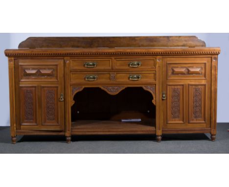 Victorian oak sideboard, rectangular top with moulded edge, drawers and cupboards surrounding an open shelf, turned legs, wid