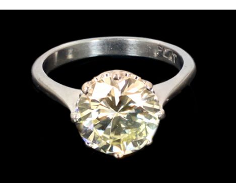 A platinum and solitaire diamond set ring, the round cut stone weighing approximately 2.50ct, with an estimated colour and cl