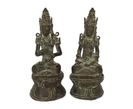 * A pair of bronze seated figures of Bodhisattva, Java, 18th/19th century, each 10cmPlease note this lot attracts an addition