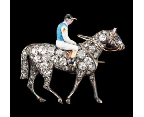 A late Victorian gold, rose cut diamond and polychrome enamel set horse and jockey brooch, 29mm, gross weight 6.6 grams.***CO