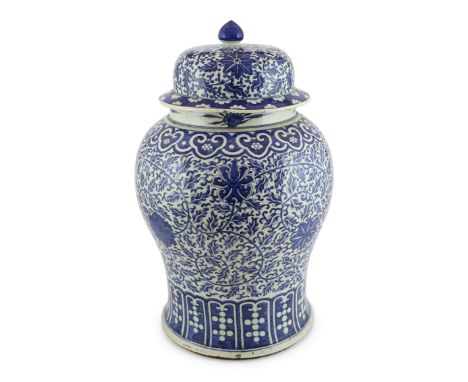 A massive Chinese blue and white ‘lotus’ vase and cover, 18th/19th century, the shoulder with repeating ruyi heads above lotu