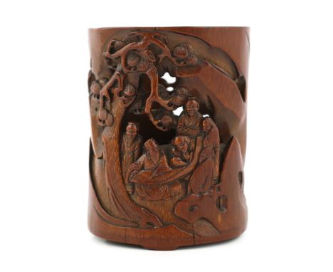 A good Chinese reticulated bamboo 'sages' brushpot, late Ming/early Qing dynasty, 17th century, finely carved in high relief 