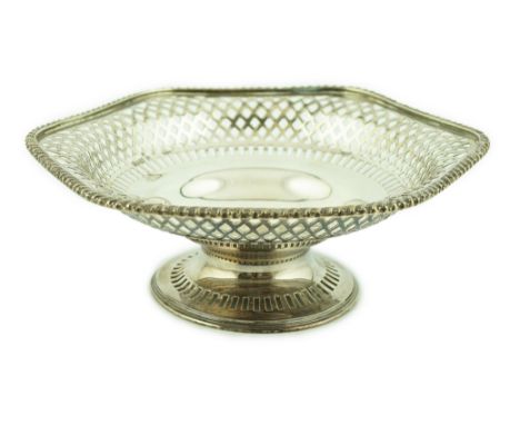 A George V circular silver tazza, by Barker Brothers, large shaped rim, gadrooned border and fretwork decoration on circular 