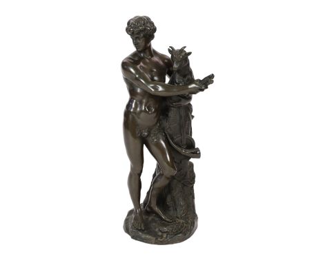 A bronze figure of Bacchus with a goat, 65cm high***CONDITION REPORT***Overall of a dark slightly dull chocolate brown patina