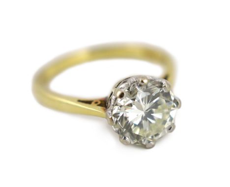 A modern 18ct gold and solitaire diamond set ring, the stone weighing approximately 2.90ct, with an estimated colour and clar