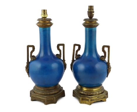 A pair of Chinese or Japanese turquoise-glazed bottle vases with Louis XVI style ormolu lamp mounts, late 19th century, 40cm 