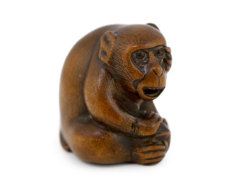 * A Japanese carved wood netsuke of an ape, Tamba School, 19th century, with inlaid eyes, 3.4cmProvenance: J. Hubbard Ltd. 12