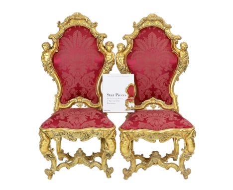 * An important pair of late 18th century Venetian carved baroque giltwood throne chairs, the seats and backs upholstered in r