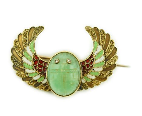 An early 20th century Carl Bacher Viennese Egyptian Revival gold (tests as 14k), diamond and three colour enamel set winged g