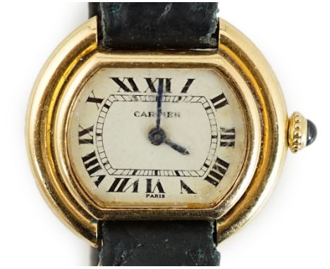 A lady's 18ct gold Cartier Ellipse manual wind wrist watch, with Roman dial and case back numbered  670812000, signed Cartier