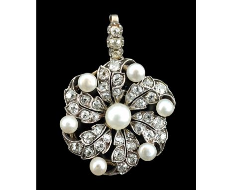 A Victorian gold, button pearl and diamond cluster set pendant, with three stone diamond set bale, of circular form, the back