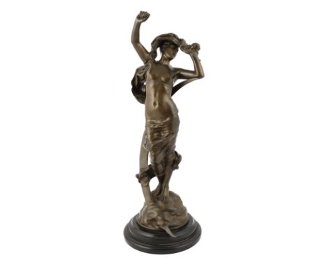 Charles Ernest Dagonet (French, 1856-1926), a bronze figure of 'La Nuit' standing with the crescent moon, upon a naturalistic
