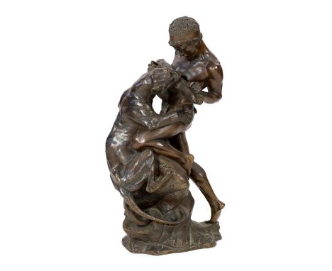 Edouard Drouot, French (1859-1945), a bronze warrior, 'La Lutte pour la Vie', standing upon a naturalistic base, signed in th