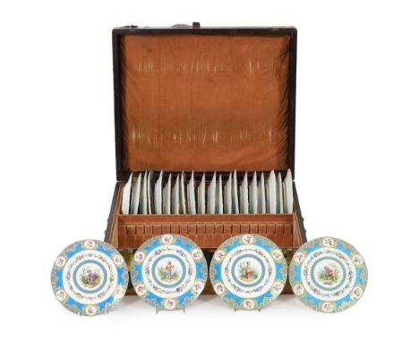 A cased set of twenty four Sevres style cabinet plates, 19th century, each painted with a boy or girl in a garden setting, wi