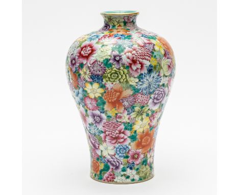 A CHINESE FAMILLE-ROSE MILLEFLEURS MEIPING VASEIron-red Qianlong seal mark but late 19th/20th century Painted with densely pa