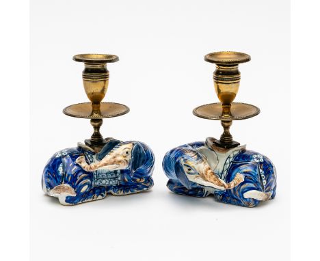 A PAIR OF CHINESE EXPORT ELEPHANT CANDLE HOLDERS (4)jiaqinq with later European gilt-metal sconces and drip pans The blue gla