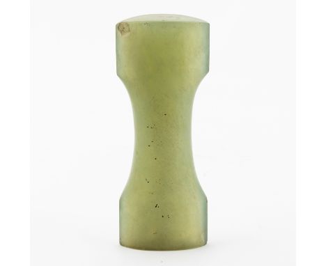 A MUGHAL STYLE  JADE DAGGER HANDLEOf waisted form, the stone of celadon tone with cream inclusions, 11.75cm lengthProvenance: