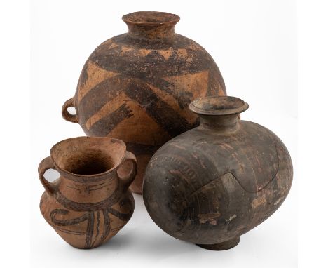 A NEOLITHIC PAINTED POTTERY JAR, GUAN (3)Yangshao Culture ( 3rd -2nd Millennium B.C) Tapered ovoid form set with a pair of lu