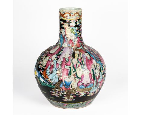 A LARGE CHINESE FAMILLE-ROSE  BLACK-GROUND BOTTLE VASELate 19th century moulded and enamelled to one side with an official se