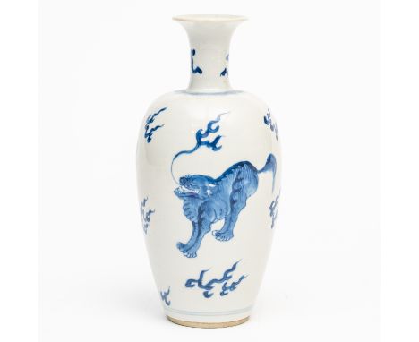 A CHINESE BLUE AND WHITE OVOID VASEKangxi  The sides painted with three Buddhist lions amongst cloud scrolls, the waisted nec