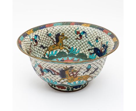 A CHINESE MING STYLE CLOISONNE BOWL19th century Decorated to the interior and exterior with horses running over waves on a wh