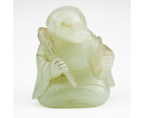A CHINESE JADE ZODIAC FIGURE OF A BOARQing dynasty Carved seated wearing robes, the stone of celadon tone, 4cm highSmall chip