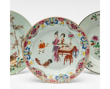THREE CHINESE EXPORT FAMILLE-ROSE PLATES (3)Qianlong One painted with two woman at a table with a boy and two hens, 22cm diam