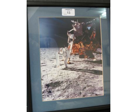 Buzz Aldrin (born 1930) - autographed colour photograph, lunar landing, framed, autograph somewhat indistinct, together with 