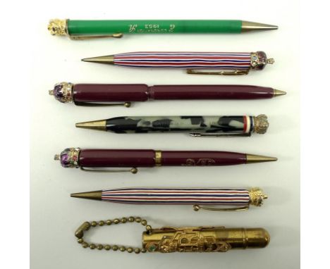 A collection of seven Coronation souvenir pencils and pens, one commemorating the coronation of George VI in 1937, and six th