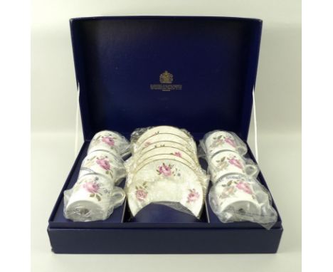 A Royal Worcester coffee set, in the 'Marissa' pattern, comprising six coffee cans and saucers, boxed. (12)