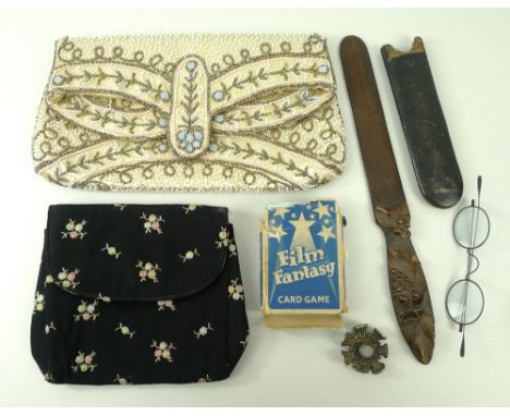 A group of miscellanea comprising a pair of Victorian spectacles, a Vintage beaded evening bag, a further evening bag, a carv