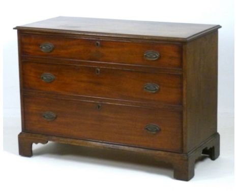 An early Victorian mahogany chest of three graduated drawers, with cock beading, oak and pine lined, and oval brass handles, 