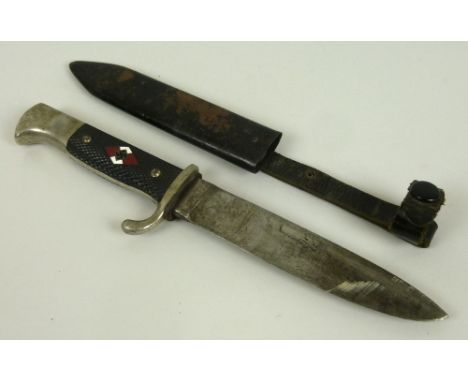 A Nazi Hitler Youth knife and sheath, with an inset diamond shaped enamel swastika, the blade stamped RZ M M7/59, blade lengt