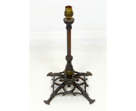 A Benson cast iron table lamp, early 20th century, with fluted copper column and pierced base with scrolling decoration, 20 b