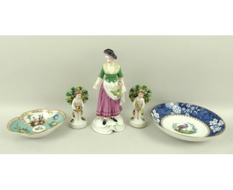 A group of ceramics comprising a Spode Chelsea figurine, number 6, a Spode saucer, the centre painted with a bird, cobalt blu