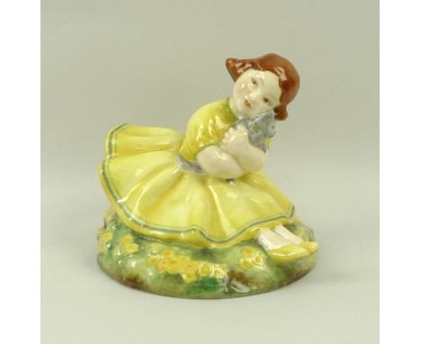 A Royal Worcester figurine 'Buttercup', modelled by Anne Acheson, circa 1935, No. 2930, puce printed mark and script title to