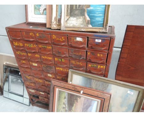 A set of vintage metal storage drawers
