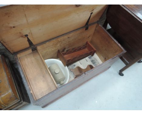 A vintage stained pine bedding box, stoneware hot water bottle etc