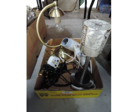 A brass table lamp, a decorative lamp and ahair dryer