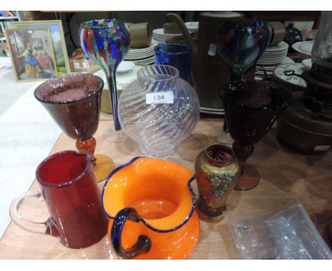 A selection of glassware including Dartington style candlestick and shade, ruby goblet and jug etc