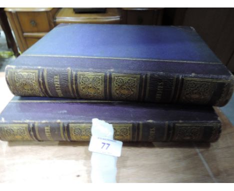 Two vintage volumes of Shakespeare's comedies and tragedies.