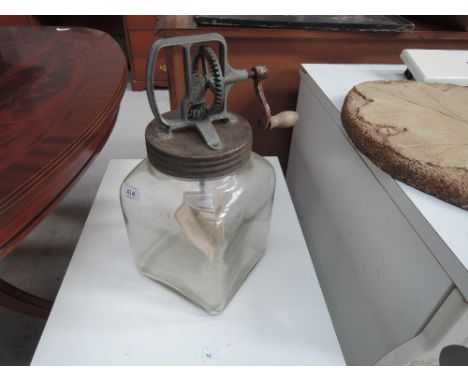 A vintage Blow butter churn