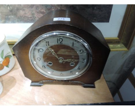 An eight day mid-20th century mantle clock