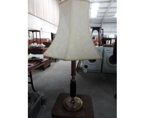 A brass effect table lamp