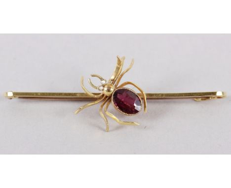 A yellow metal spider brooch, stamped 9ct, set amethyst and seed pearls, 2.7g 